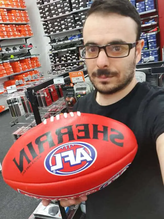Holding up a footy